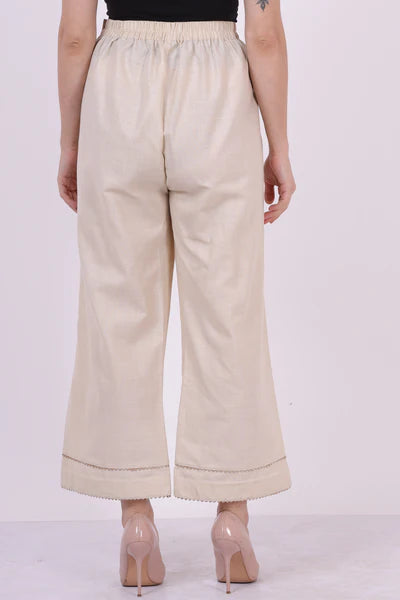 A woman wearing Beige Colored Keengri Culottes.