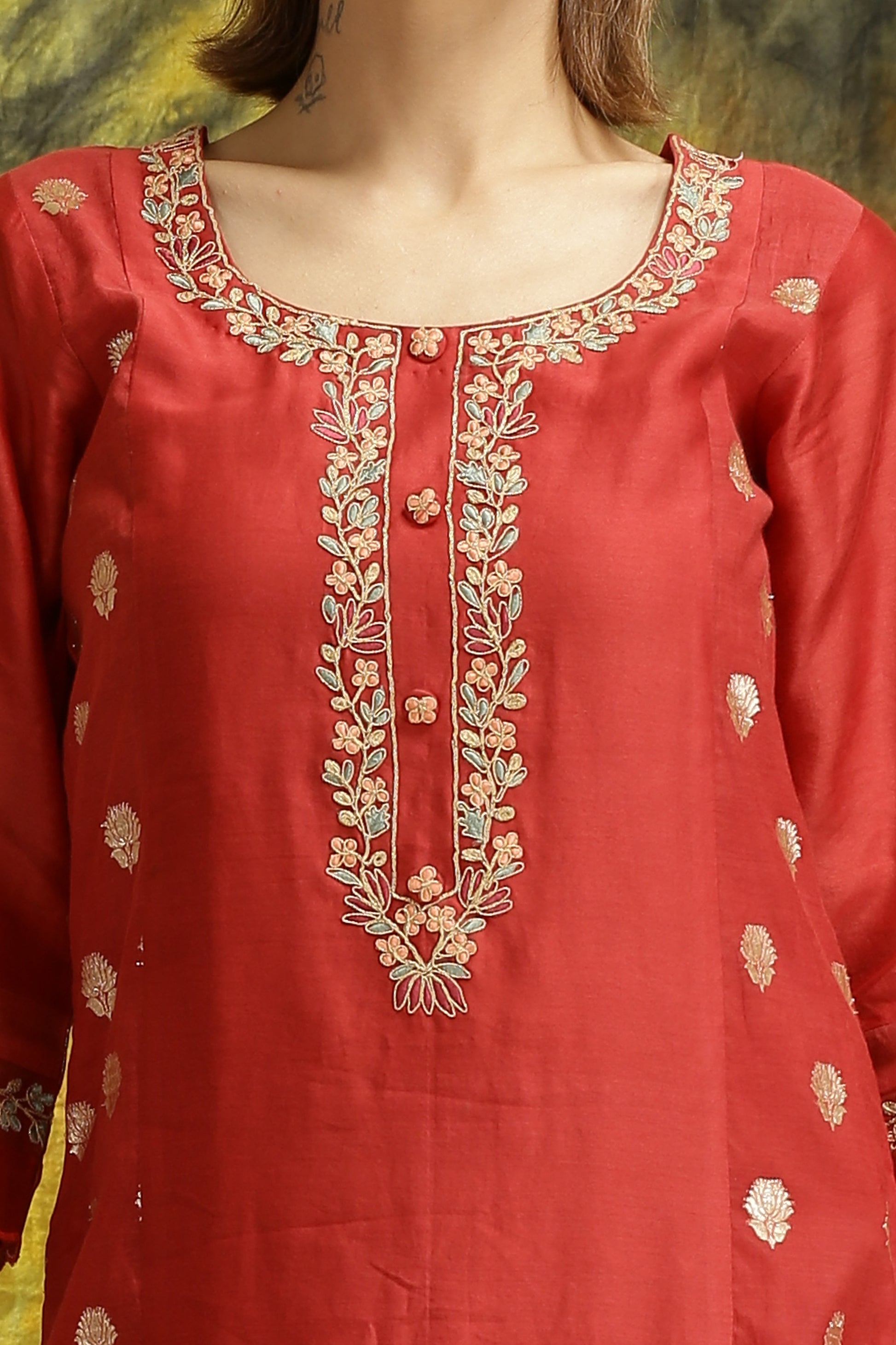 A woman wearing Meenakshi Collection Red Colored Suit Set.