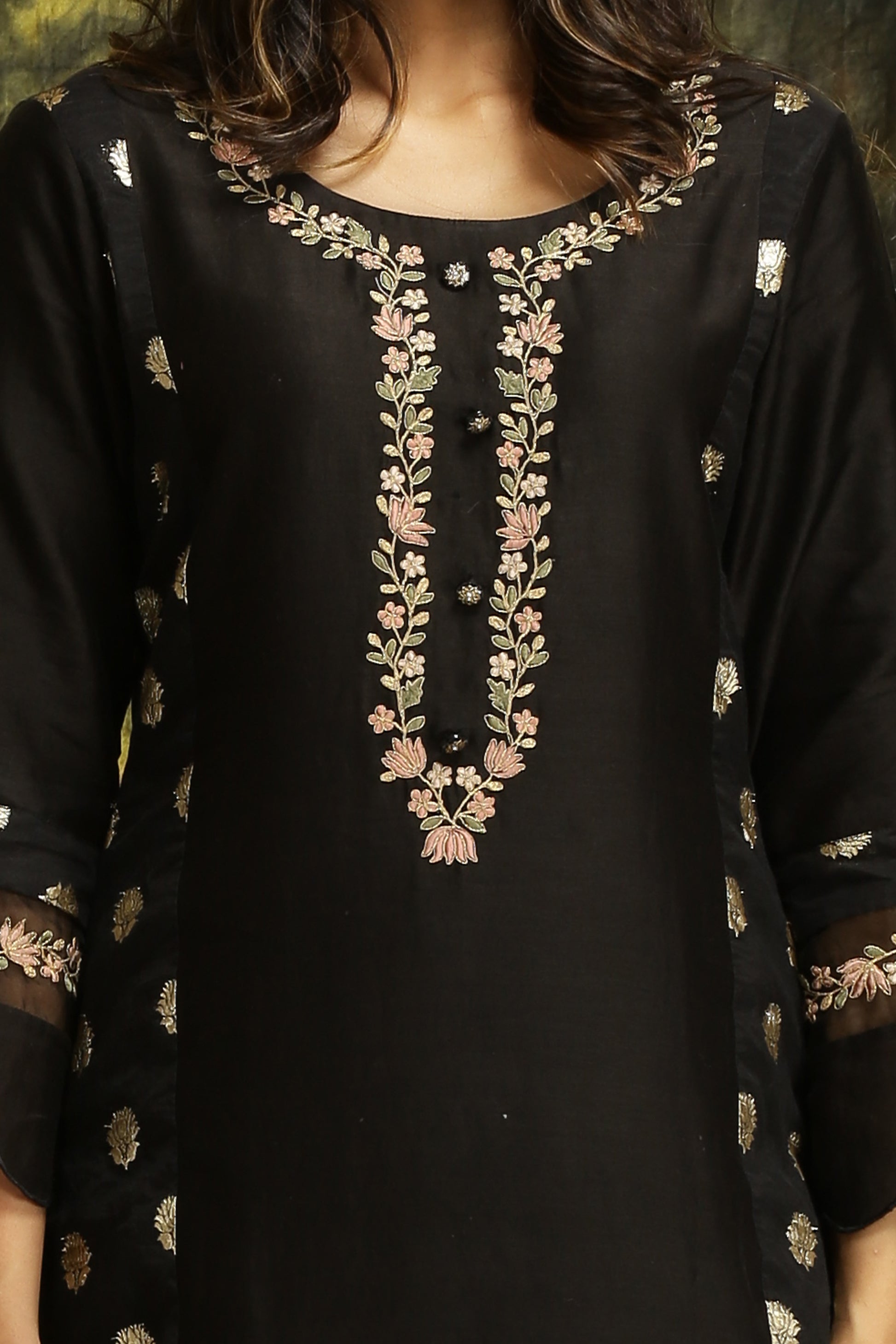 A woman wearing Meenakshi Collection Black Colored Suit Set.