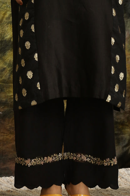 A woman wearing Meenakshi Collection Black Colored Suit Set.