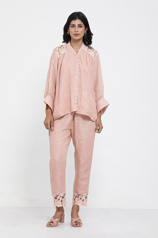 A woman wearing Saral Linen Plain Co-ord Set of Salmon Pink Color.