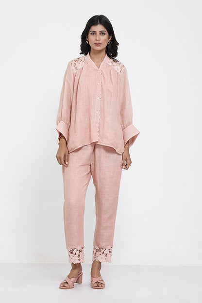 A woman wearing Saral Linen Plain Co-ord Set of Salmon Pink Color.